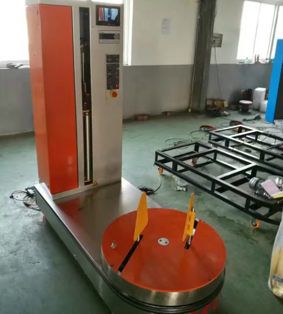 行（háng）李纏繞機